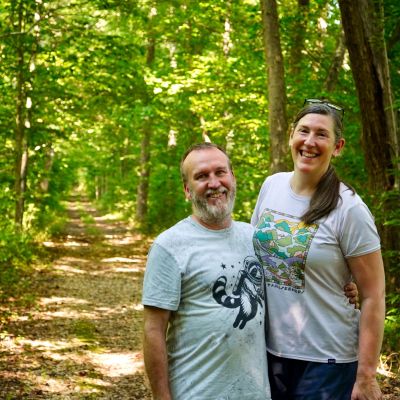 Jenna and Warren Veazey pose on the Dahlgren Railroad Heritage Trail in King George County, Virginia.